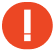 A white exclamation mark centered on a solid red circle, symbolizing a warning or important notice.